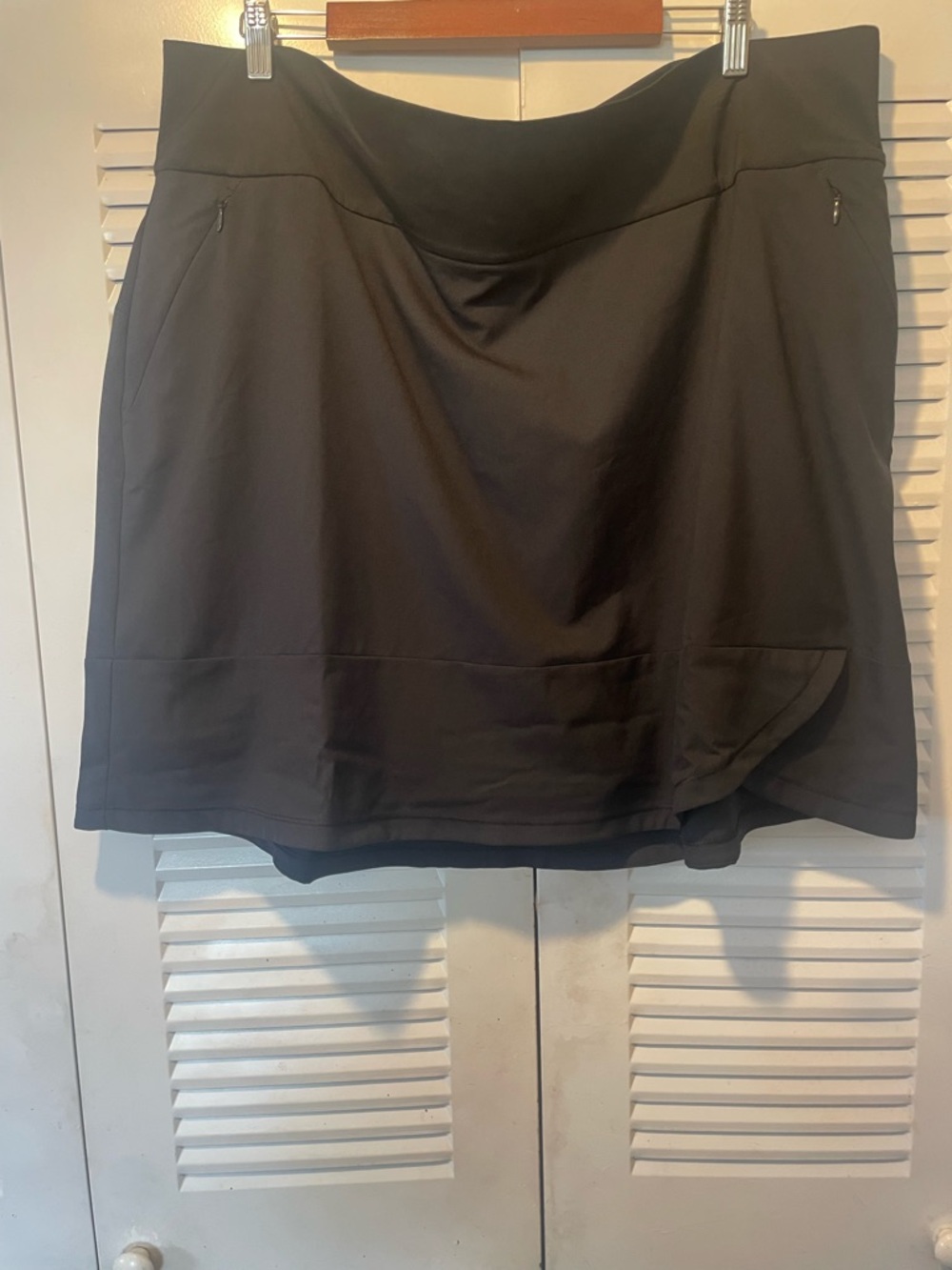 Addidas Women’s Frill Skort with front zip pockets and back zipper